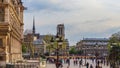 Paris / France - April 04 2019: Square in front of Hotel de Ville, the MunicipalityÃÂ of Paris, full of resting people at sunset.